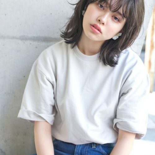 Everything You Need To Know About The Wolf Haircut Trends