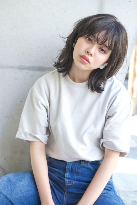 Everything You Need To Know About The Wolf Haircut Trends