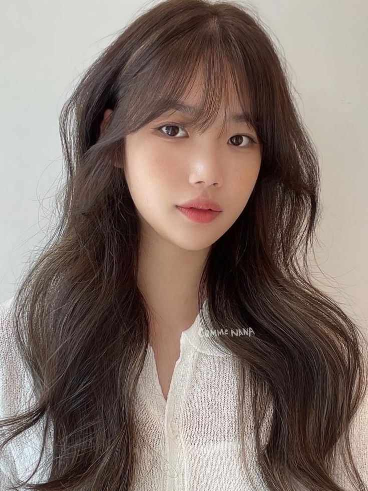 Achieving the Pretty Hair With Korean Wispy Bangs Trend