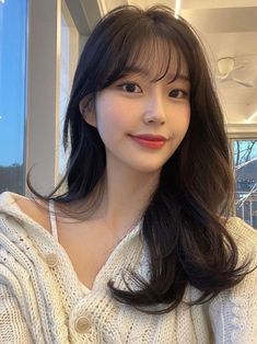 Achieving the Pretty Hair With Korean Wispy Bangs Trend