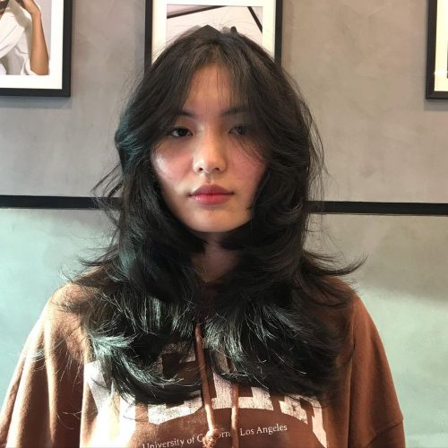 Everything You Need To Know About The Wolf Haircut Trends