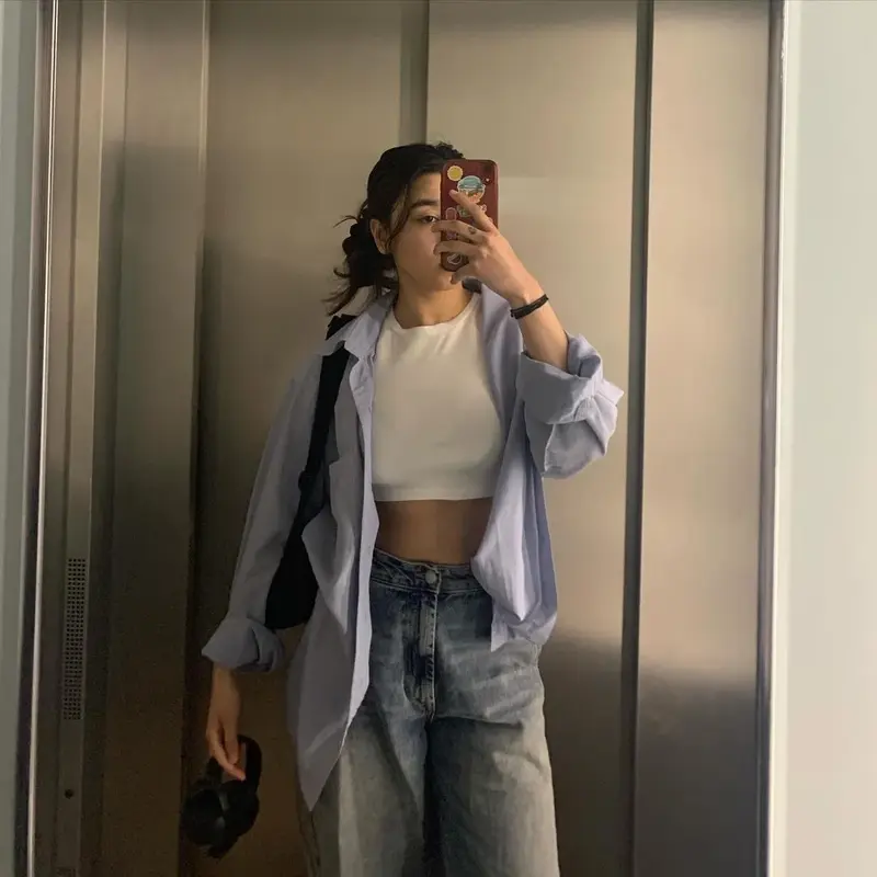 Chic Ways to Style a Blue Striped Button-Up For Spring/Summer 2024